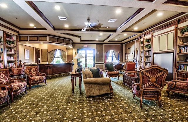 living area with ceiling fan, coffered ceiling, beamed ceiling, crown molding, and dark carpet