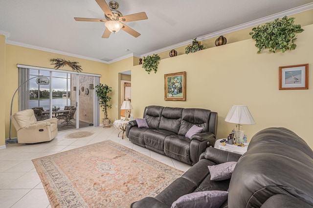 tiled living room with crown molding and ceiling fan