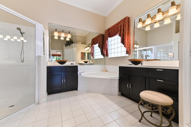 bathroom featuring tile patterned floors, ornamental molding, vanity, and independent shower and bath