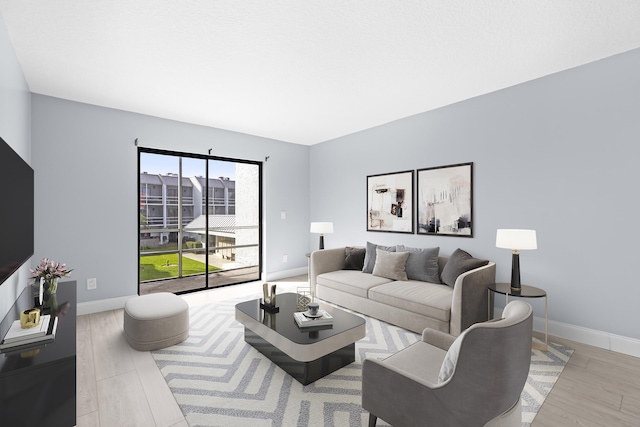 living room with light hardwood / wood-style floors