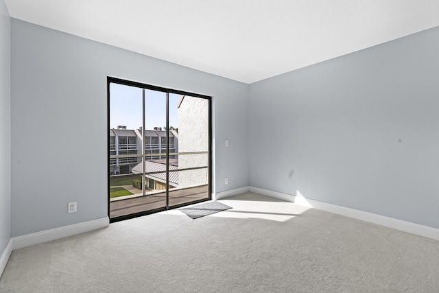 view of carpeted spare room