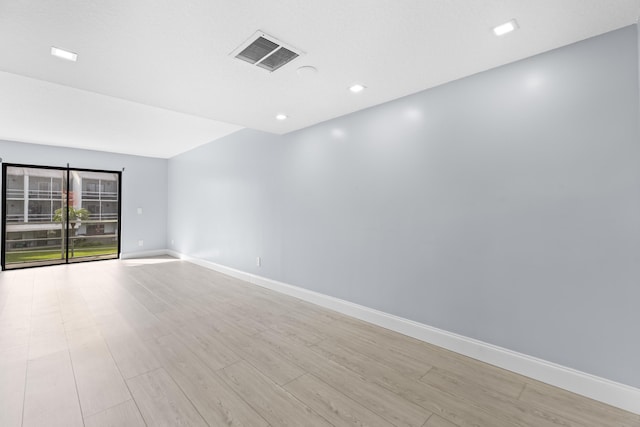 empty room featuring light hardwood / wood-style flooring