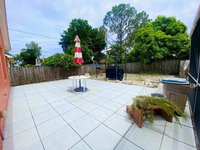 view of patio with a grill