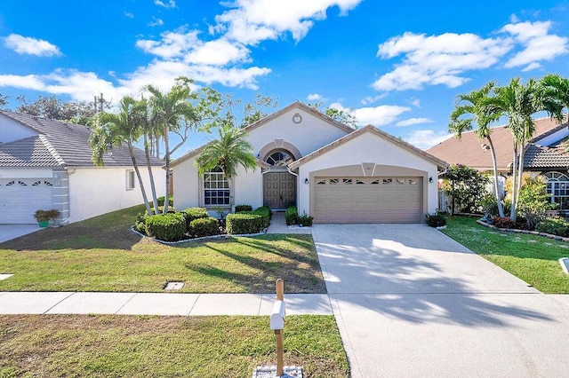 single story home featuring a front lawn and a garage