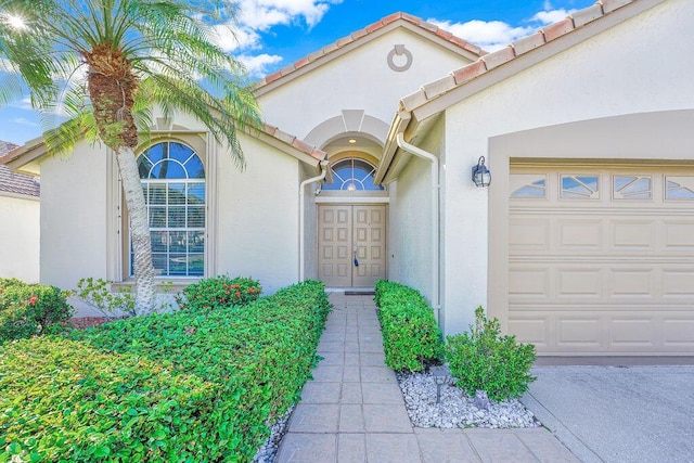 property entrance featuring a garage