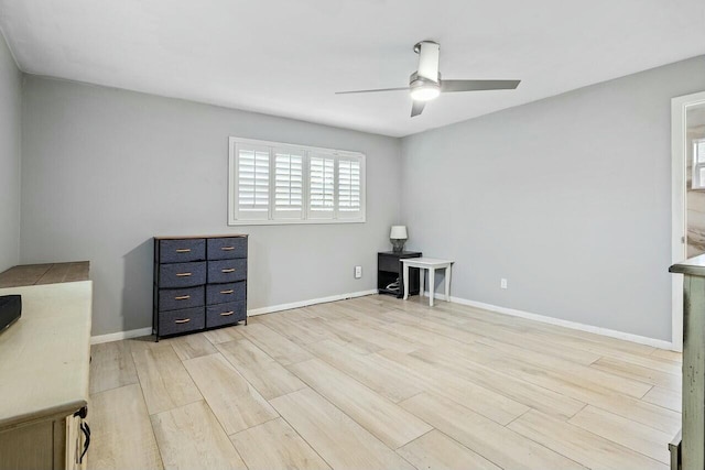 interior space with ceiling fan and light wood-type flooring