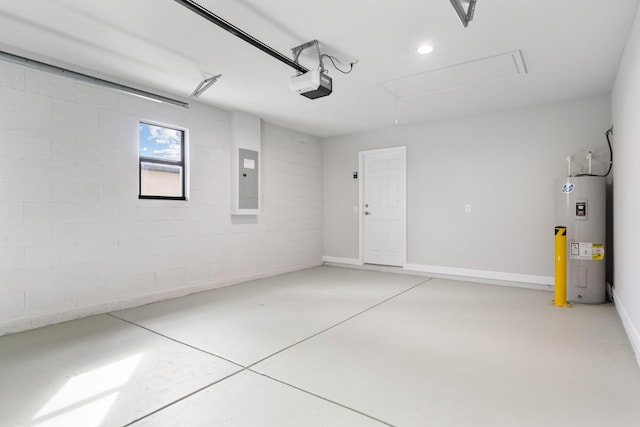 garage featuring concrete block wall, electric panel, a garage door opener, electric water heater, and recessed lighting