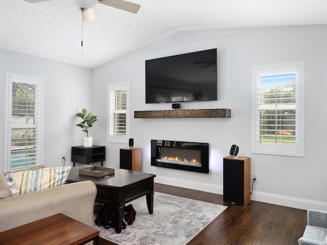 living room with vaulted ceiling, ceiling fan, and dark hardwood / wood-style floors