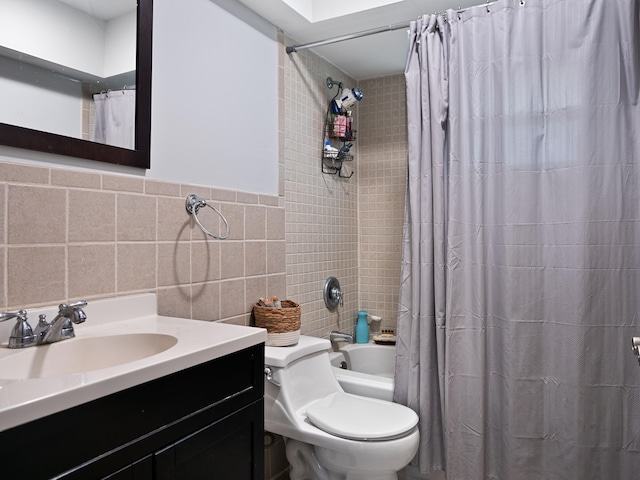 full bathroom featuring shower / bath combo, vanity, toilet, and tile walls