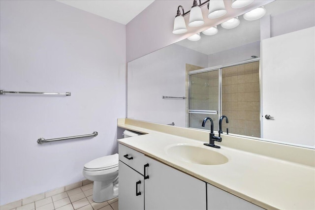 bathroom with toilet, an enclosed shower, tile patterned flooring, and vanity