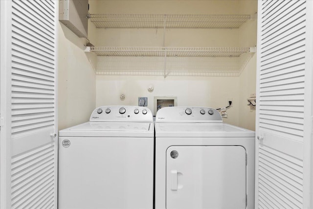 laundry area featuring washing machine and dryer