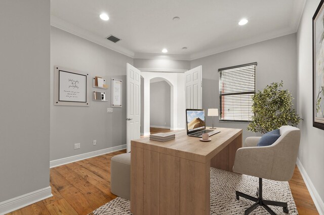 office featuring hardwood / wood-style floors and ornamental molding