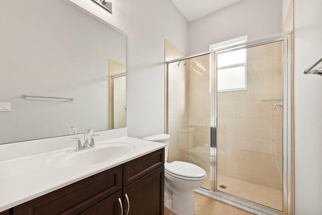 bedroom featuring ensuite bath and light hardwood / wood-style flooring