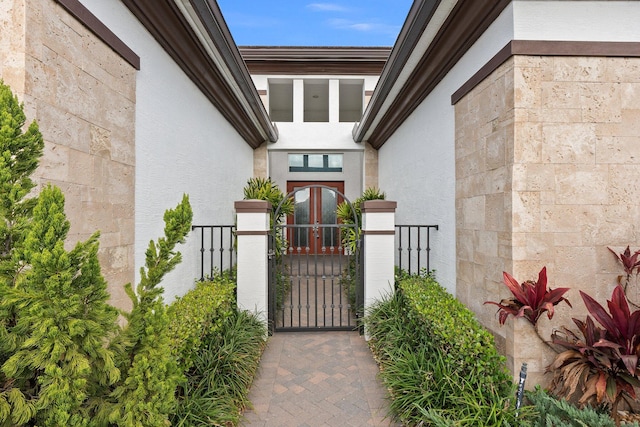 view of gate with french doors