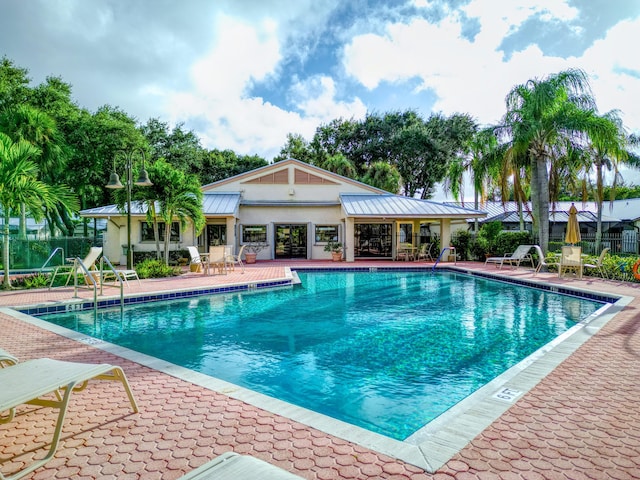 view of pool with a patio