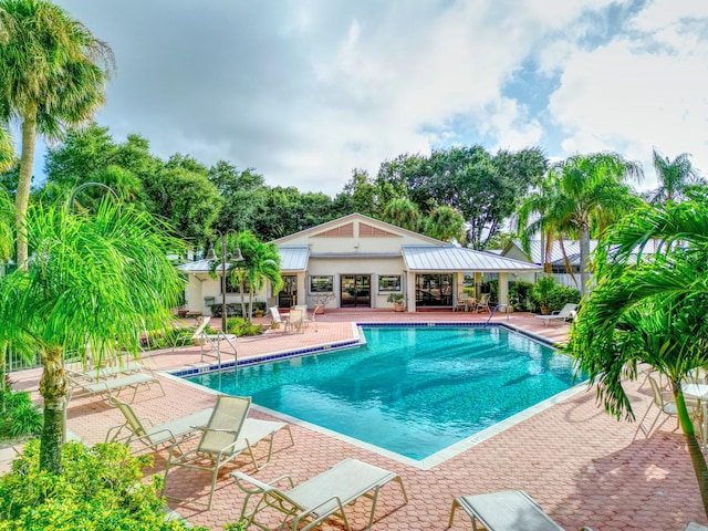 view of pool featuring a patio area