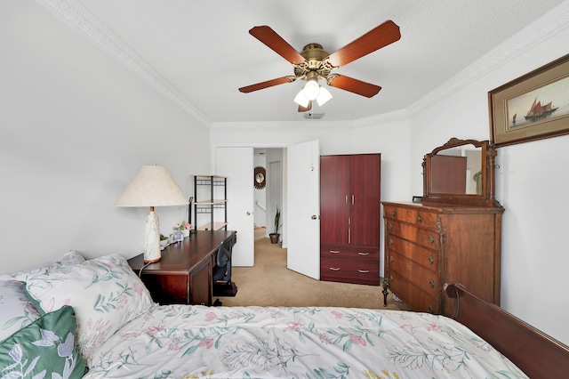 carpeted bedroom with ceiling fan, a textured ceiling, and ornamental molding