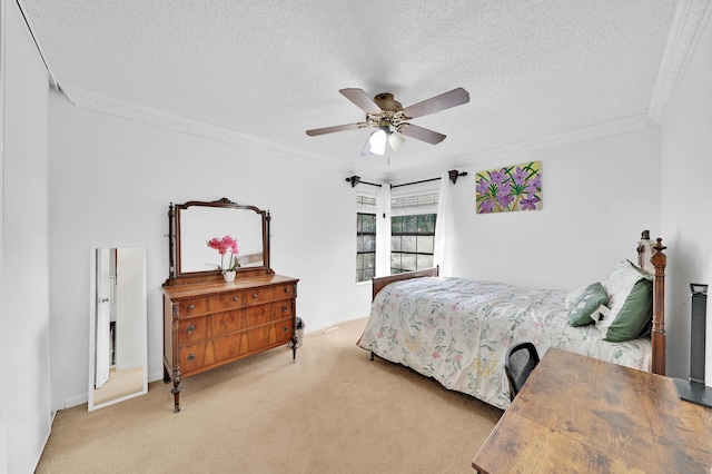 bedroom featuring light carpet, a textured ceiling, and ceiling fan