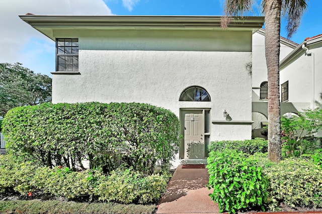 5258 Europa Dr Unit H, Boynton Beach, FL 33437 - view of front of property featuring stucco siding