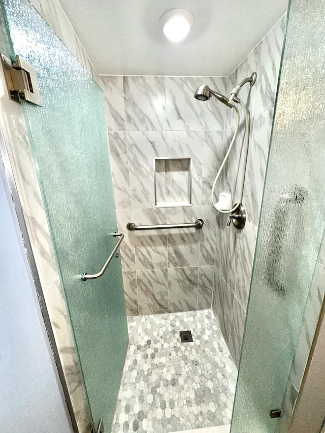 bathroom featuring walk in shower