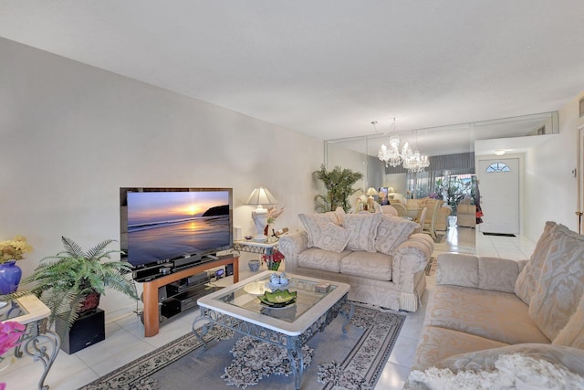 living room with light tile patterned floors and a notable chandelier