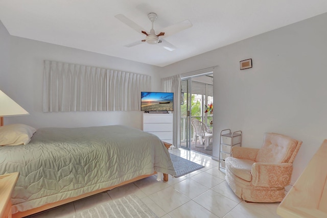 bedroom featuring access to exterior, light tile patterned floors, and ceiling fan