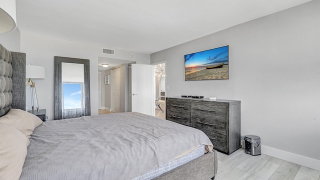 bedroom featuring light wood-type flooring