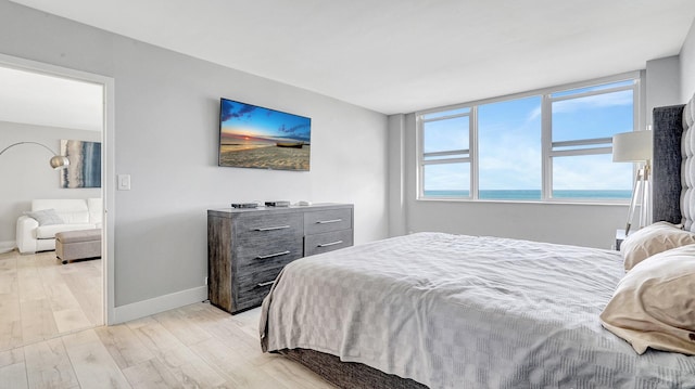 bedroom with light hardwood / wood-style flooring