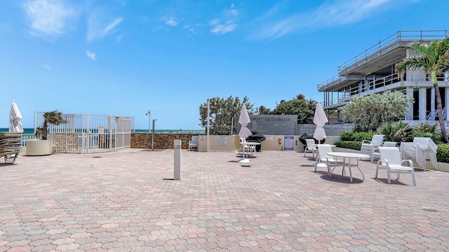 view of patio / terrace featuring a water view