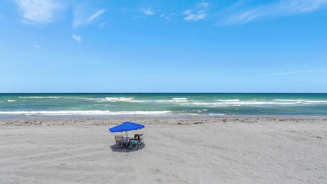 property view of water with a beach view