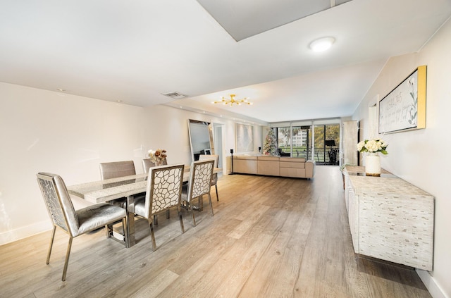 dining space featuring light hardwood / wood-style flooring