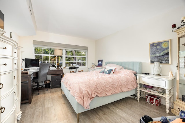 bedroom with light hardwood / wood-style flooring