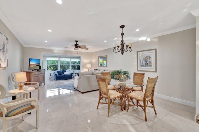 dining space featuring crown molding and ceiling fan with notable chandelier