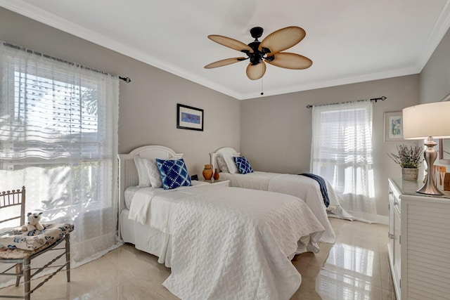 tiled bedroom with ceiling fan, ornamental molding, and multiple windows