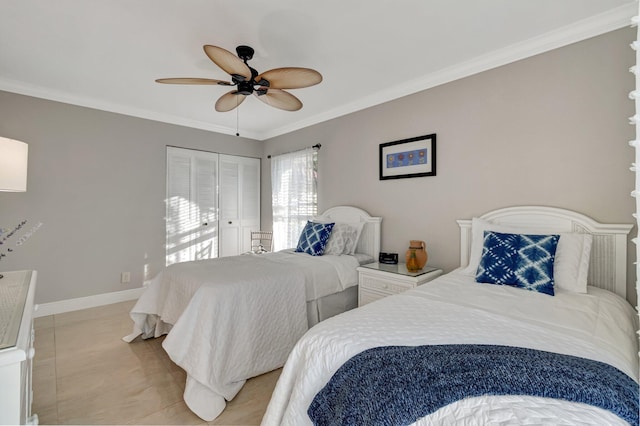 tiled bedroom featuring a closet, ceiling fan, and ornamental molding