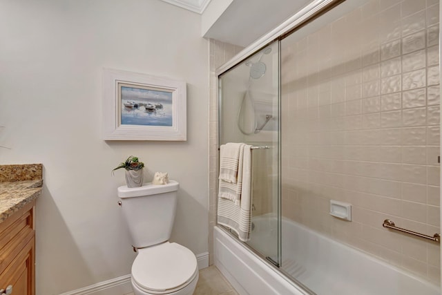 full bathroom with vanity, toilet, and bath / shower combo with glass door