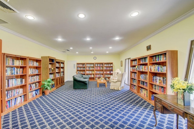 living area with carpet flooring and ornamental molding