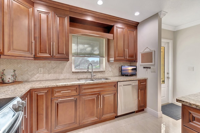 kitchen with light stone counters, crown molding, sink, and appliances with stainless steel finishes