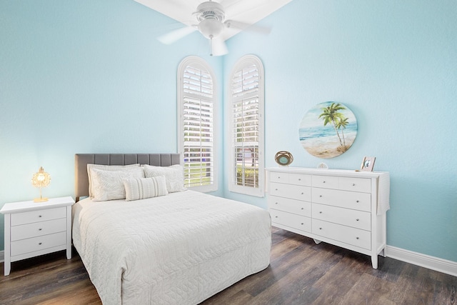 bedroom featuring ceiling fan and dark hardwood / wood-style floors