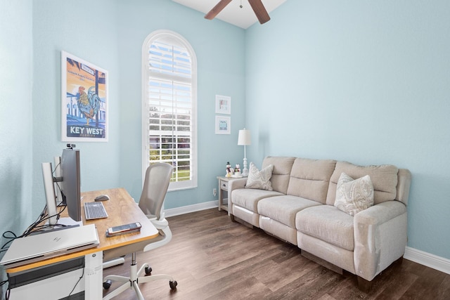 office featuring dark hardwood / wood-style floors and ceiling fan