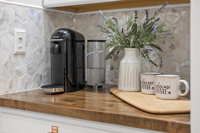 interior details featuring decorative backsplash