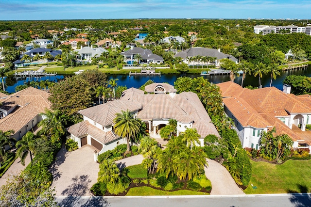 drone / aerial view with a water view