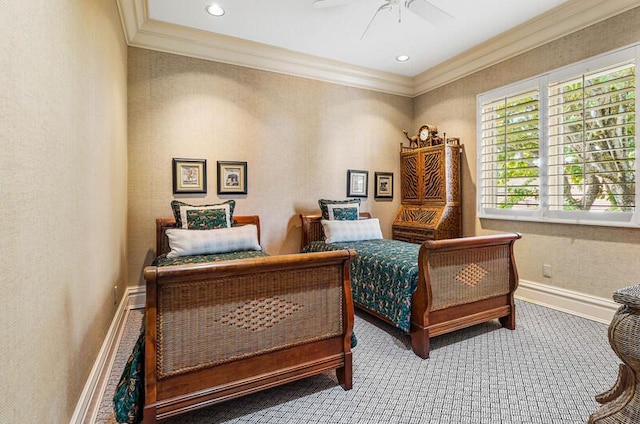 carpeted bedroom with ceiling fan and crown molding