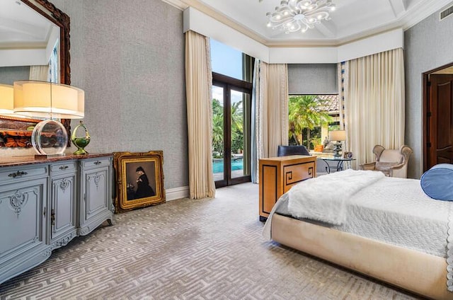 bedroom with access to exterior, french doors, crown molding, an inviting chandelier, and carpet floors