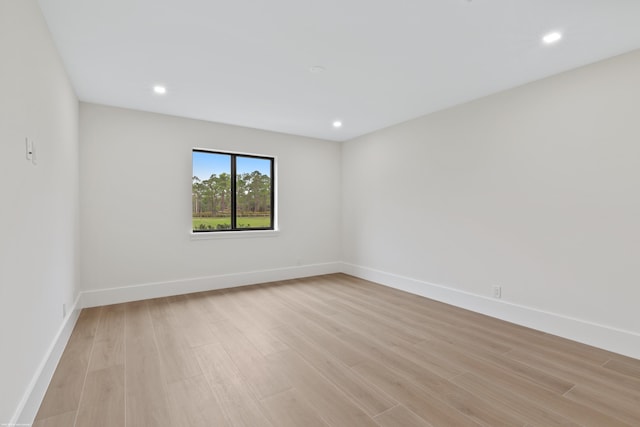 unfurnished room featuring light wood-type flooring