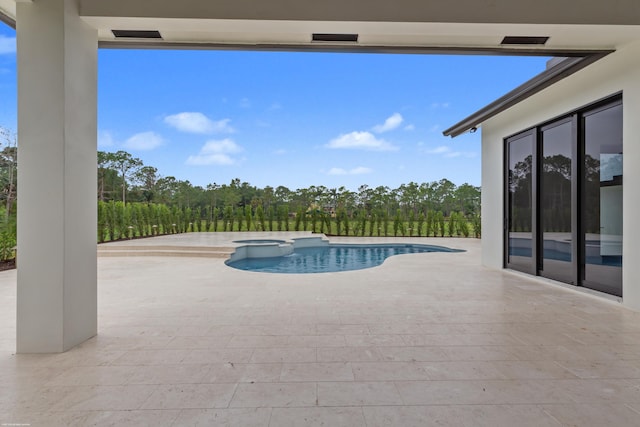 view of swimming pool featuring an in ground hot tub and a patio