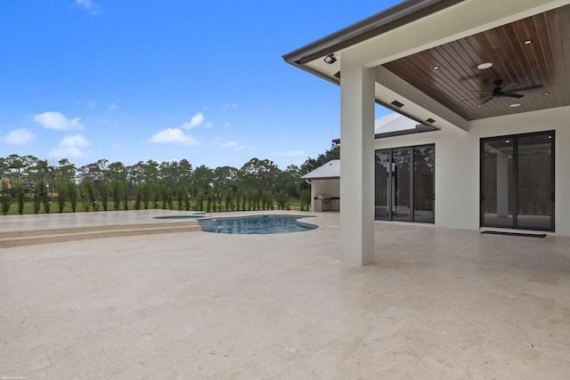 view of pool with a patio area and ceiling fan