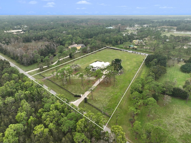 birds eye view of property featuring a rural view