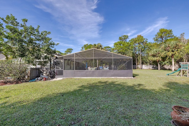 view of yard with a lanai