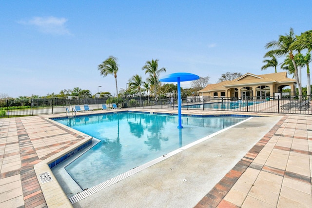 view of swimming pool featuring a patio